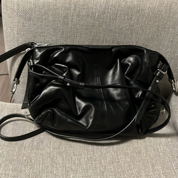 NWOT 

Rag & Bone black leather crossbody. Not worn. 10 by 7. Strap 19-22. - Picture 4 of 9